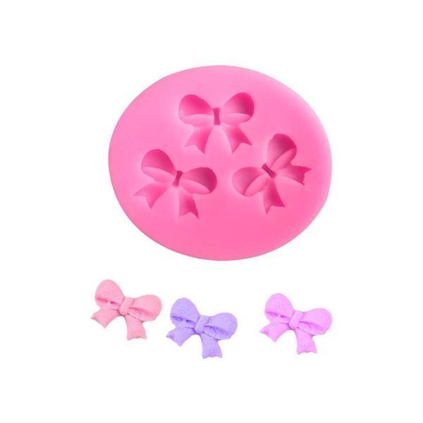 Молд силіконовий Бантики 58 на 50 мм рожевий 2032 фото